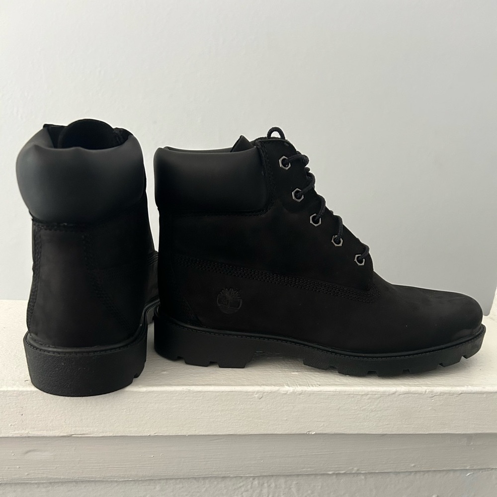 Brand new Juniors 6.5 Black Leather Timberland’s